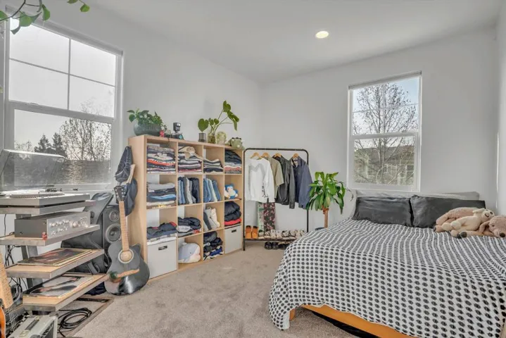 Bedroom featuring carpet floors and recessed lighting