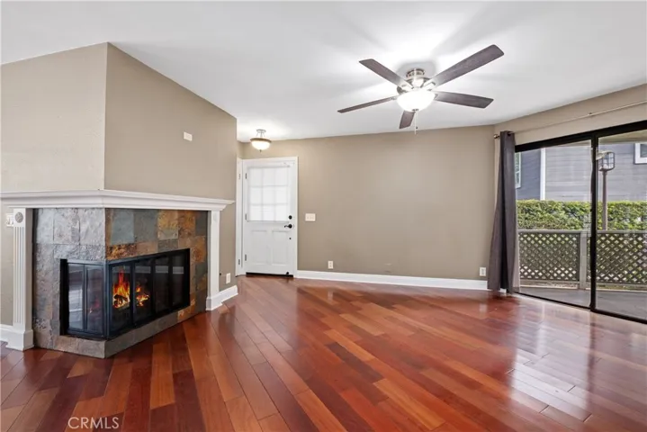 living room w sliding door to patio