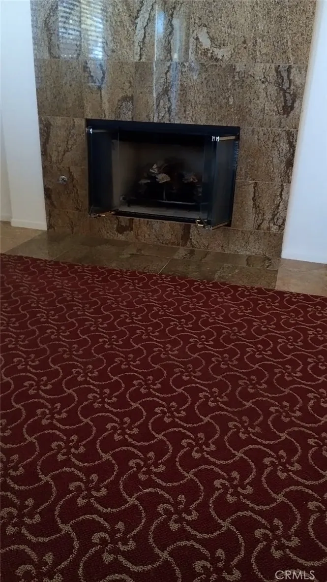 Granite Surround Fireplace in Great Room.