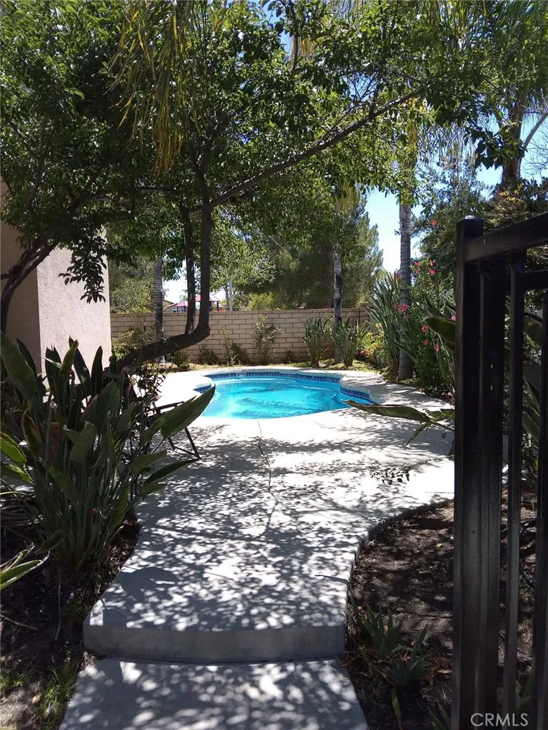 Walkway leading to the Pool and Garden Area.