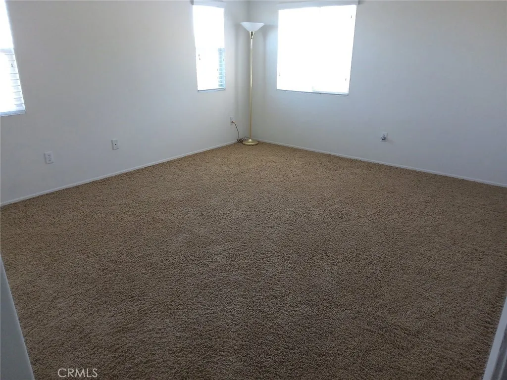Large Bedroom Upstairs
overlooking the rear of home.