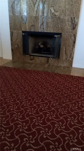 Granite Surround Fireplace in Great Room.