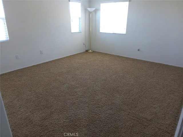 Large Bedroom Upstairs
overlooking the rear of home.