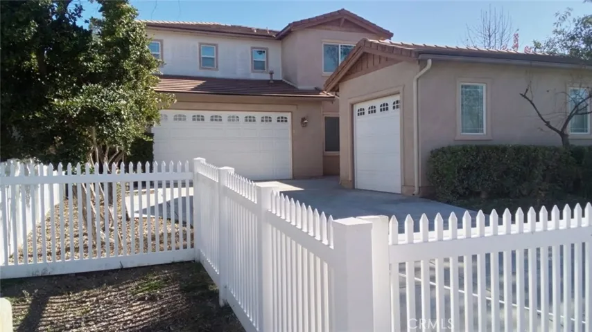 View of 3-Car Garage and Additional Single-Car garage