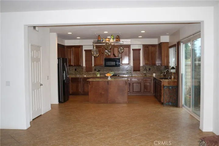 Enough room for dining with a Large Pantry and door leading into the garage.