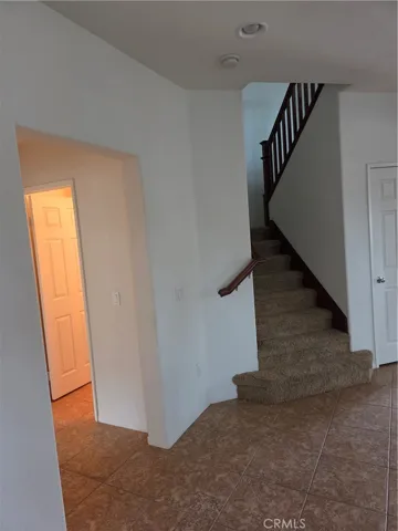 Entryway leading to Downstairs Bedroom and Downstairs Bathroom.