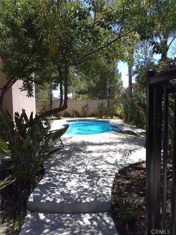 Walkway leading to the Pool and Garden Area.