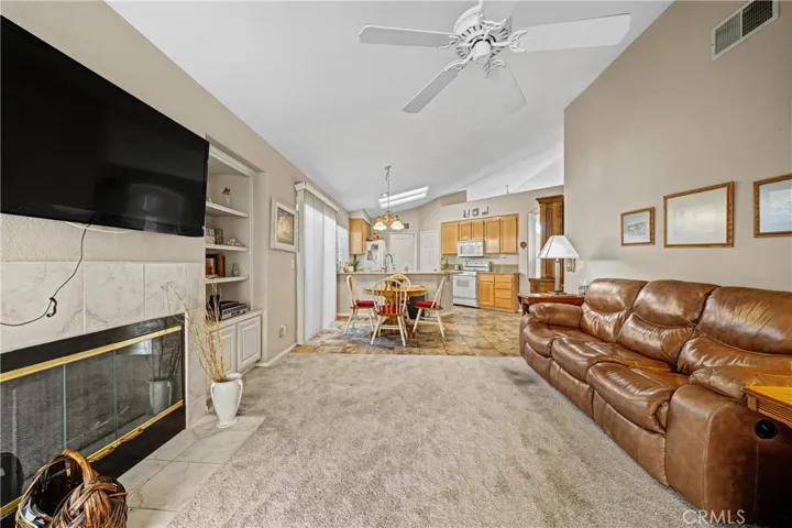 Family Room Featuring Fireplace And Media Wall