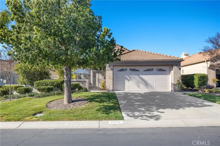 Welcoming Front Exterior With Lush Landscaping And Curb Appeal