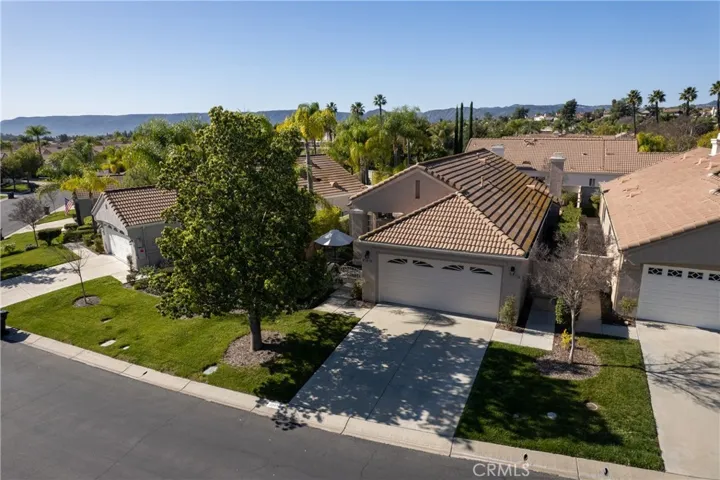 Aerial View Showcasing Roofline And Lot Placement. Home owners association maintains the front yard to include watering of front