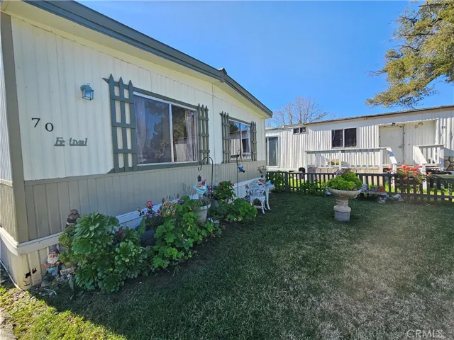Large front yard with established landscaping
