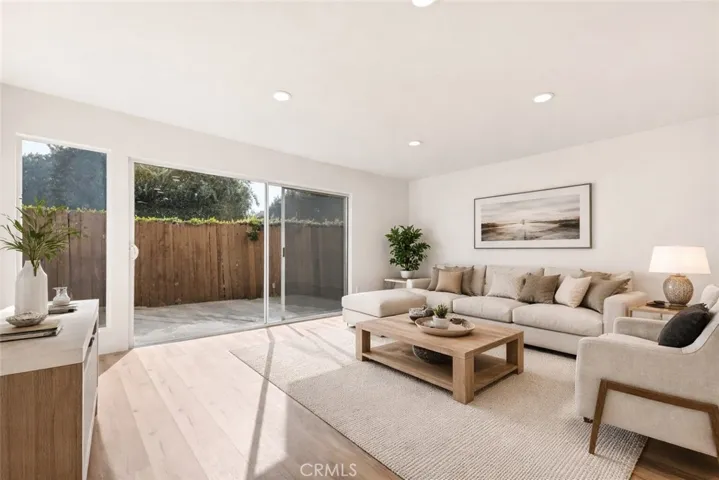 Sun filled living room. Virtually staged