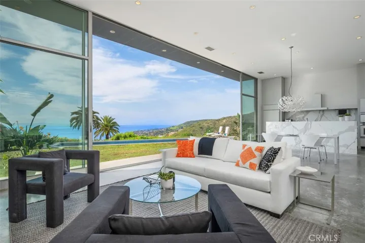 Walls of glass open.