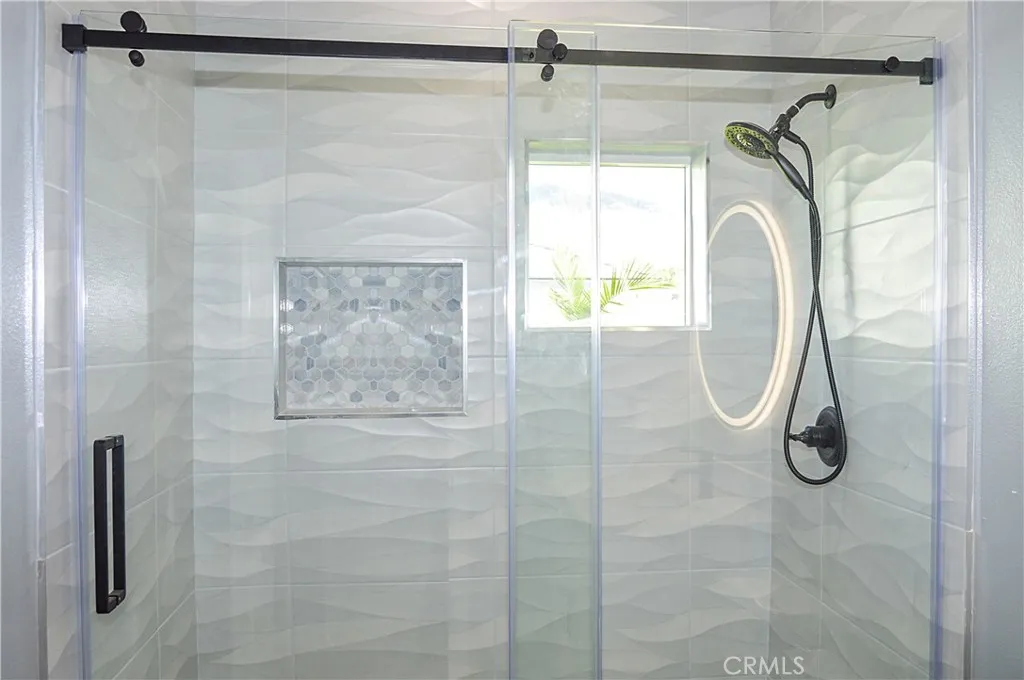 Unit 2 - 2nd Bath with glass-enclosed shower and lighted mirror