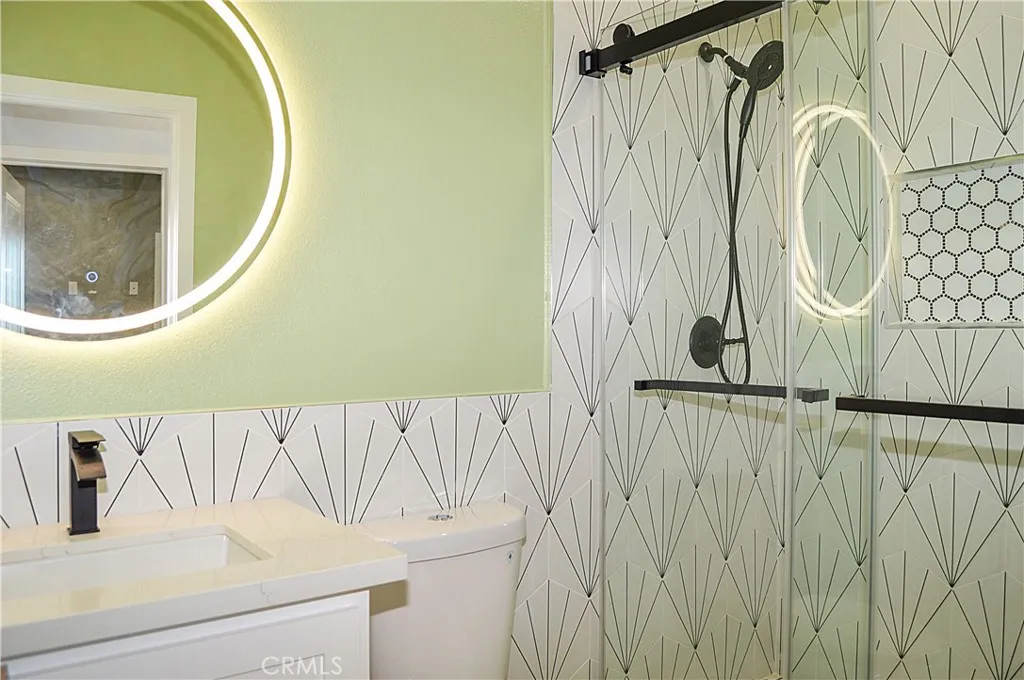 Unit 1 - 3rd Bath with Custom-Tiled Shower and Lighted Mirror