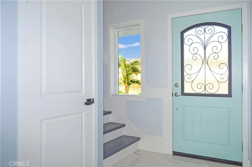 Unit 1 - Closet Under Stairs by Entry