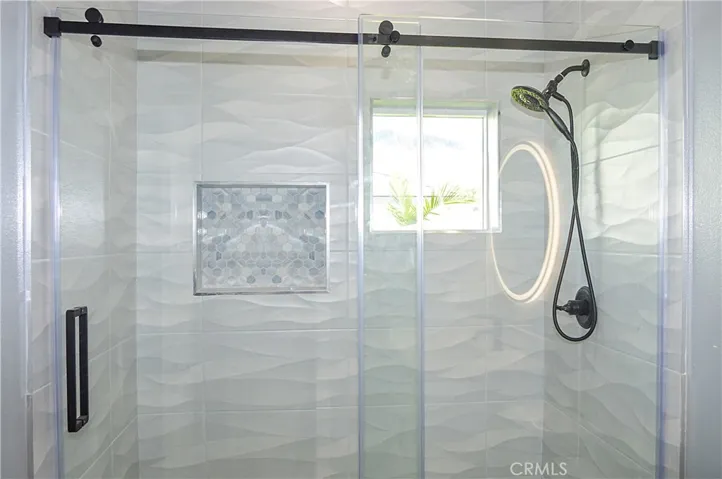 Unit 2 - 2nd Bath with glass-enclosed shower and lighted mirror