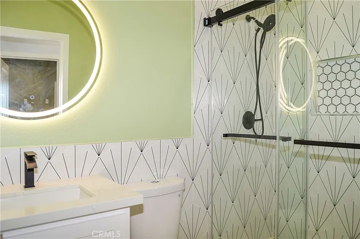 Unit 1 - 3rd Bath with Custom-Tiled Shower and Lighted Mirror