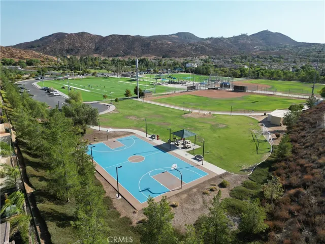 Vibrant setting combining pools, play, and outdoor leisure.