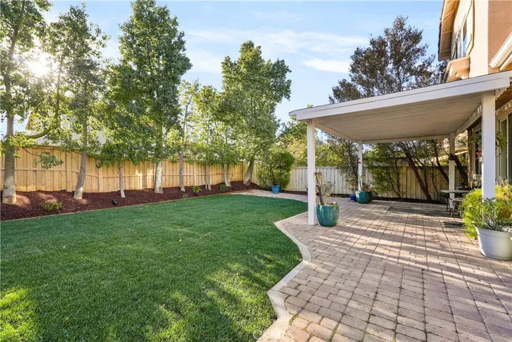 Thoughtfully updated landscaping with contemporary DG and mulch finishes.