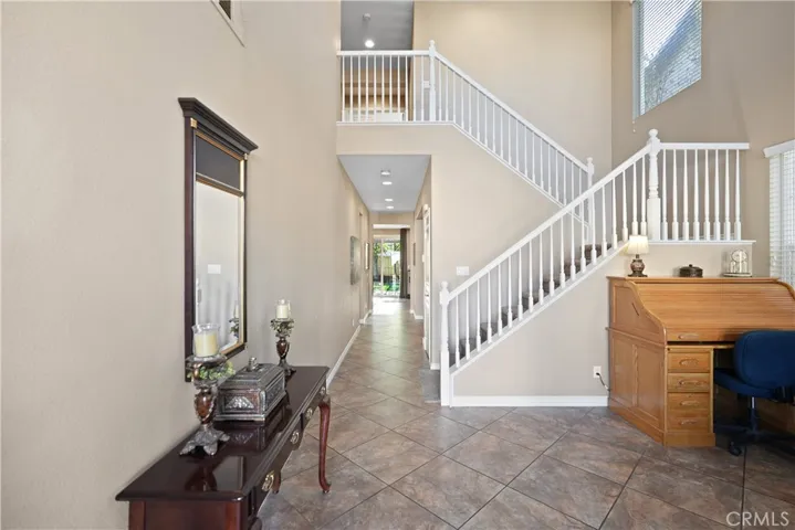 A grand yet understated foyer welcomes you home.