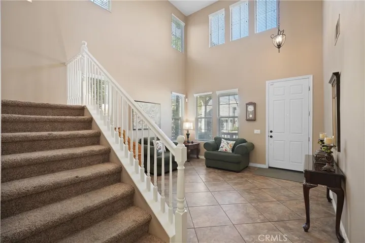 Living room featuring soaring high ceilings.