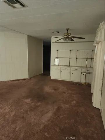 Glass shelving in Living Room