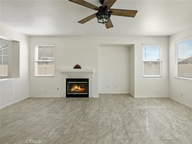 You will enjoy your fireplace in your spacious family room. Easy maintenance tile floor, freshly painted and new ceiling fan.