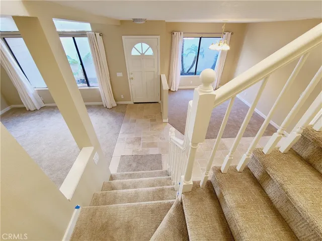 Formal Dining, Entry, and Living Rooms seen from Stairs