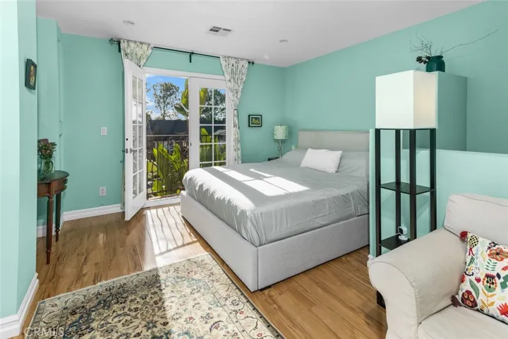 Upstairs is a sunny bedroom suite