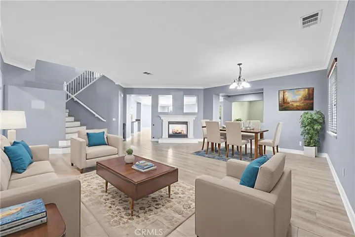 virtually staged & digitally altered - Living Room & Dining Room