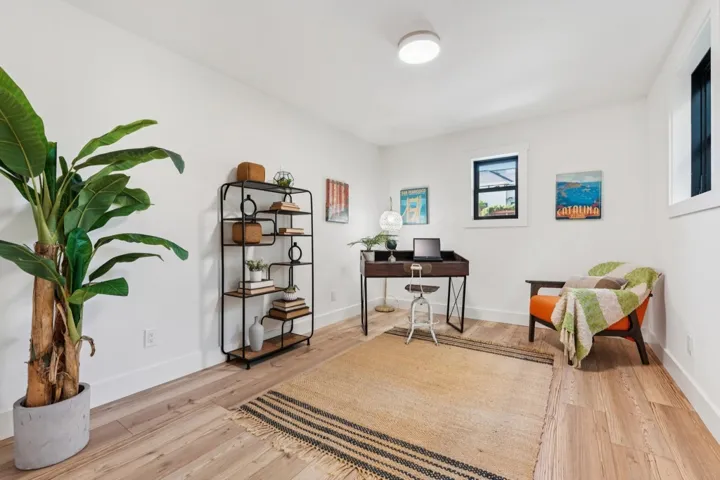 Office featuring baseboards and light wood-style floors