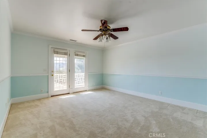 Upstairs bedroom with access to the deck