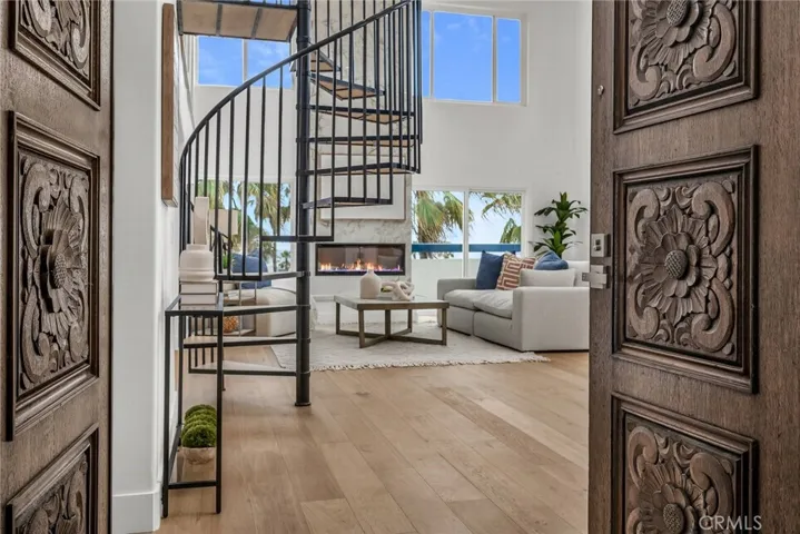 Impressive penthouse with dual entry doors, a spiral staircase to the guest room or home office, phenomenal, sweeping views.