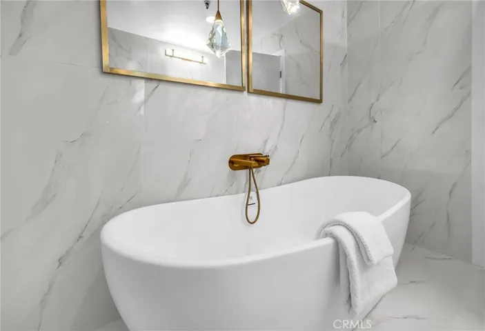Primary bedroom has 2 baths this one features a relaxing soaking tub