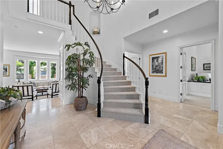 Once you walk through the door you will find a suite off to the right that is currently being used as an office but has it's own private bathroom with back yard access.  Beautiful built-ins!