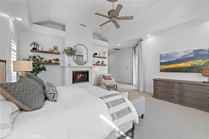 The primary suite is just fabulous and best of all is located on the main floor!  Its so spacious, so bright, so convenient and a beautiful peaceful oasis witgh direct access to the rear yard!