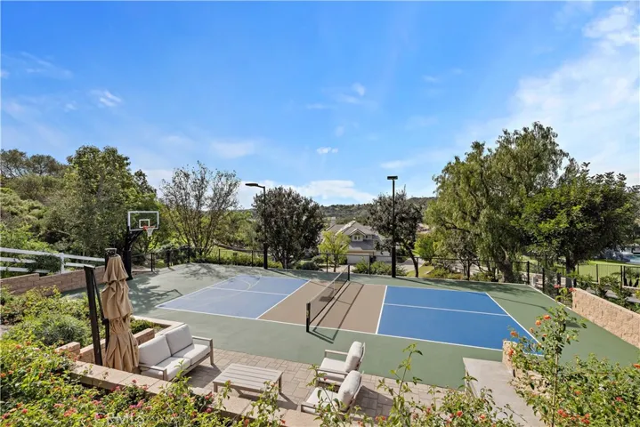 A capping climax is your amazing private, lighted pickleball court and basketball standard for hours and hours of fun, parties, crazy competition with the people you love to be with and lets not forget the awesome little retreat and mini kitchen ..... ALL WITH A GORGEOUS PANORAMIC VIEW!  Just imagine your sunset evenings and victories!!!!!