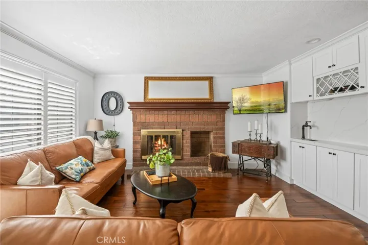 Cozy family room with gas log fireplace.