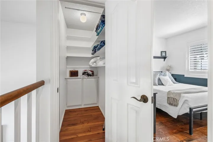 Large walk in linen closet at the end of upstairs hallway.