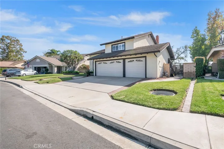 Large Driveway for parking plus 3 car garage.