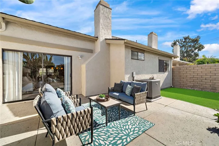 Sliding glass doors off living room open to this wonderful private patio