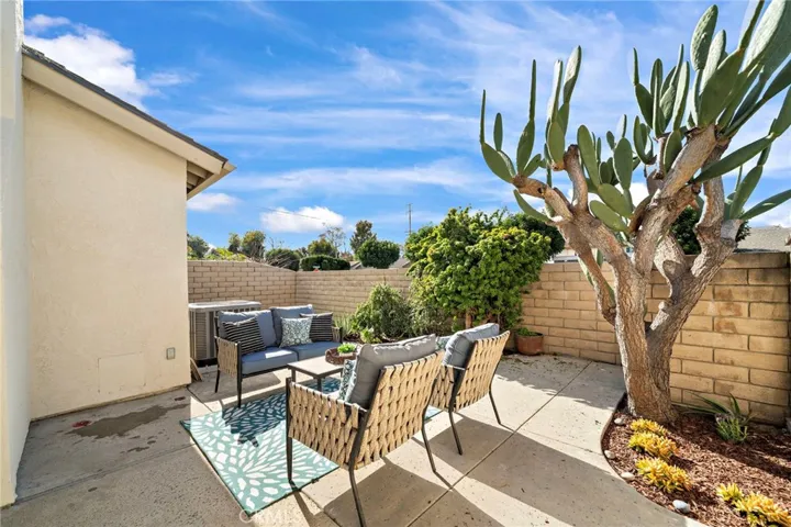 Sliding glass doors off living room open to this wonderful private patio