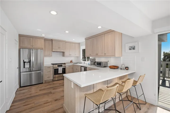 Upon Kitchen perfect for hosting. Views and Balcony.