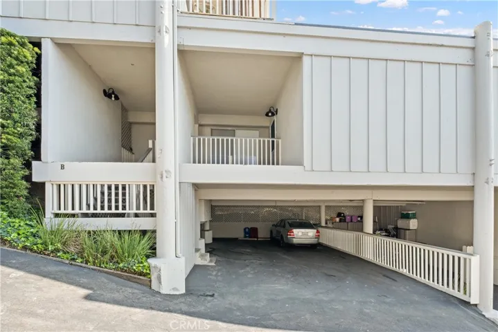 2 car tandem garage. Uncovered.