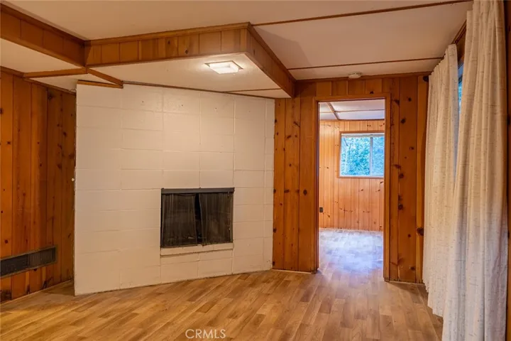 Downstairs Main bedroom with fireplace.