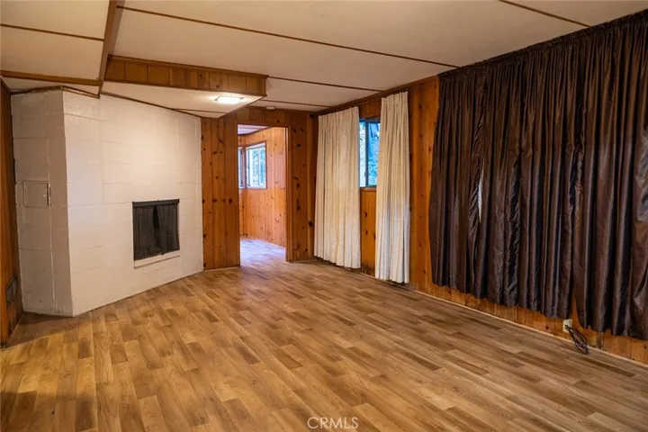 Huge bedroom downstairs with Fireplace, Laundry room and 3/4 Bathroom.