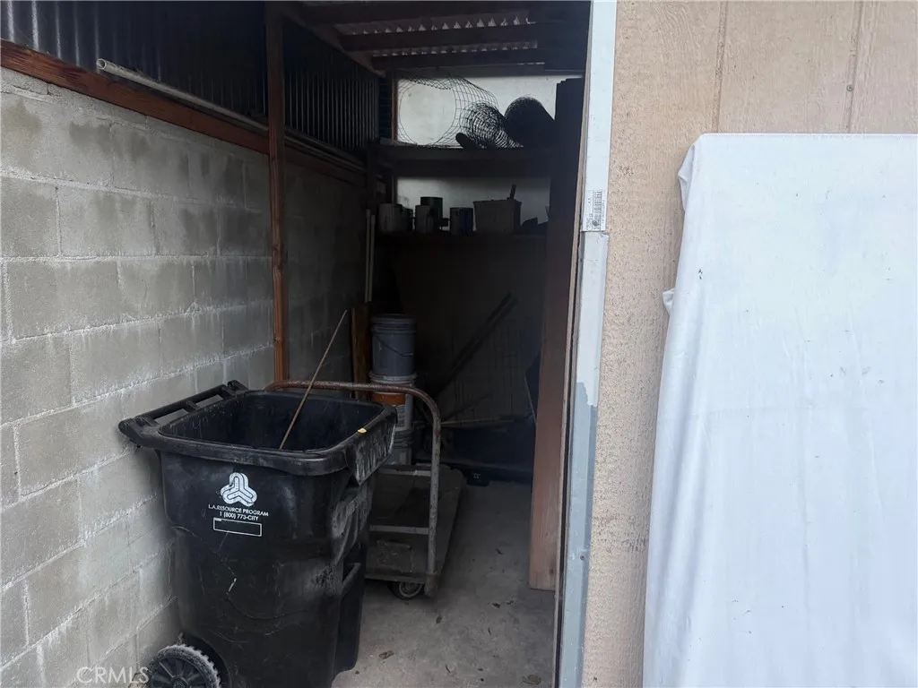 Storage space, behind the garage.