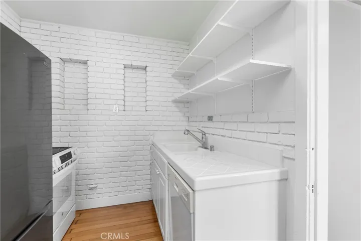 New Oven, newer refrigerator plus dishwasher in kitchen.