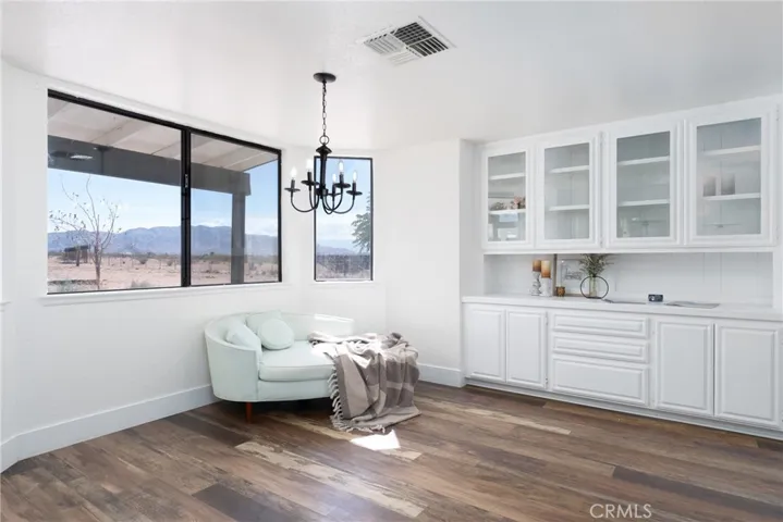 Dining w/built in decorative cabinetry